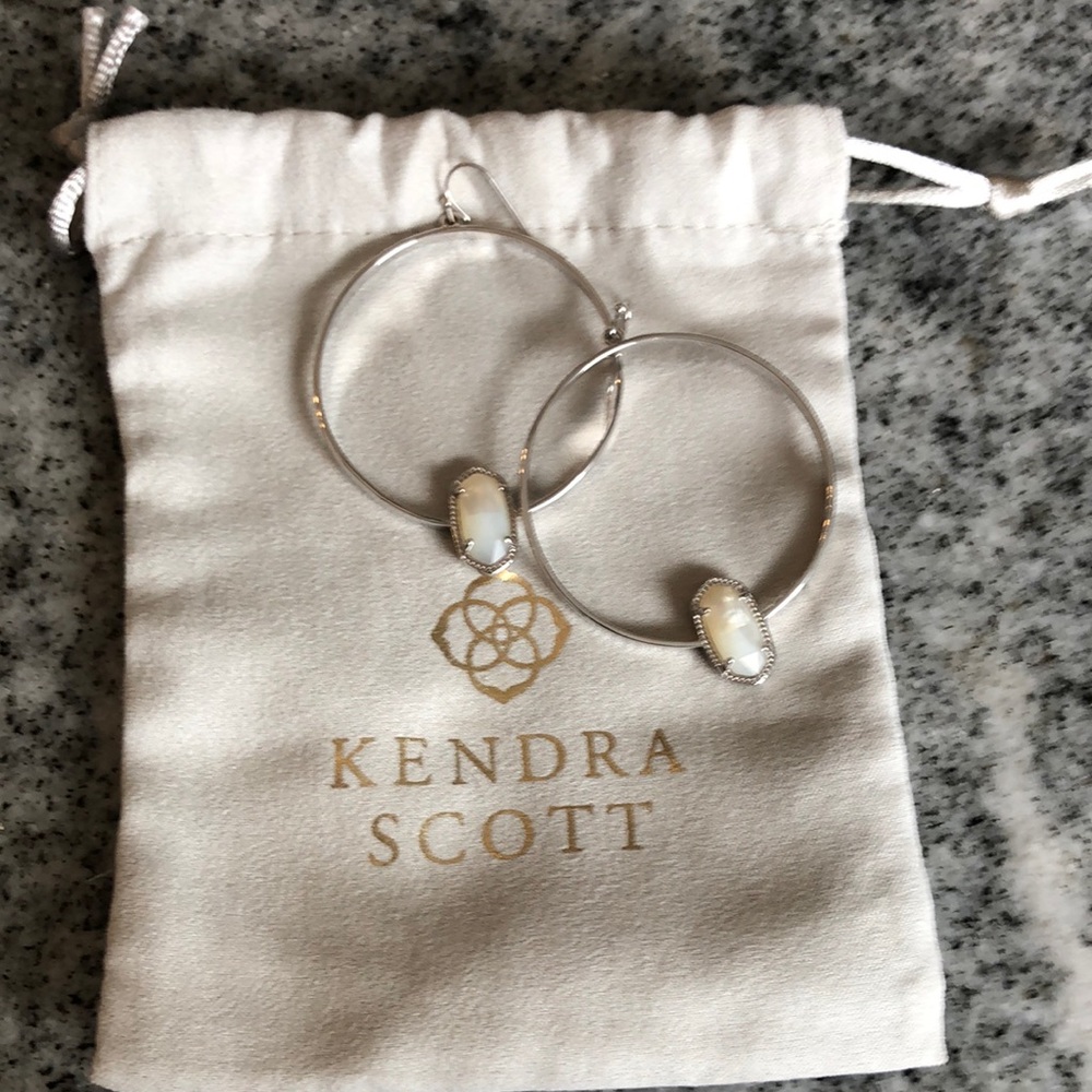 Kendra Scott hoops.